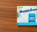 Mountain Breeze Cool Mint Strips package on a wooden surface, highlighting the fresh, sugar-free breath solution.