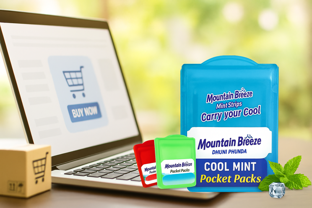 Buy mouth freshener online with Mountain Breeze cool mint strips shown beside laptop shopping page and mint leaves