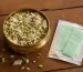 Traditional Indian mukhwas mix with fennel seeds, sesame, and sugar-coated fennel next to Mountain Breeze mouth freshener strips