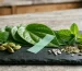 Paan-flavoured mouth freshener without tobacco or supari shown with fresh betel leaves and mint