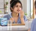 Young adult with braces managing bad breath and oral hygiene after a meal